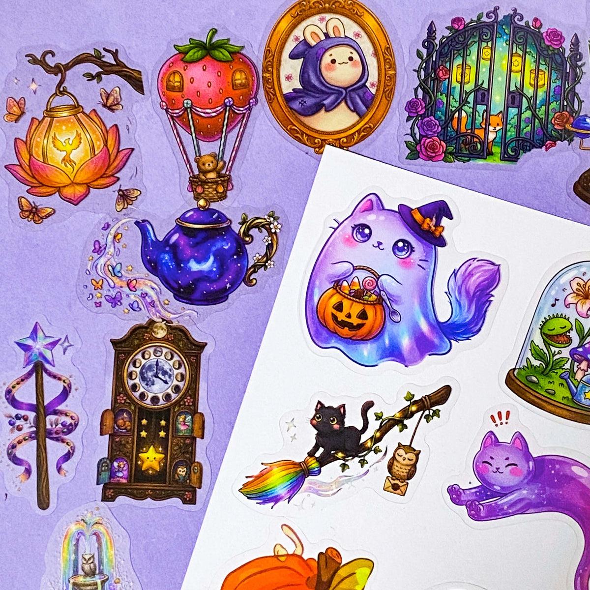 a pocketful of magic pet clear stickers, 50 different halloween and witchy designs including magical cats, potion books, celestial creatures, pumpkins, animals, owls, clocks and enchanted objects, uk cute and kawaii stationery shop.