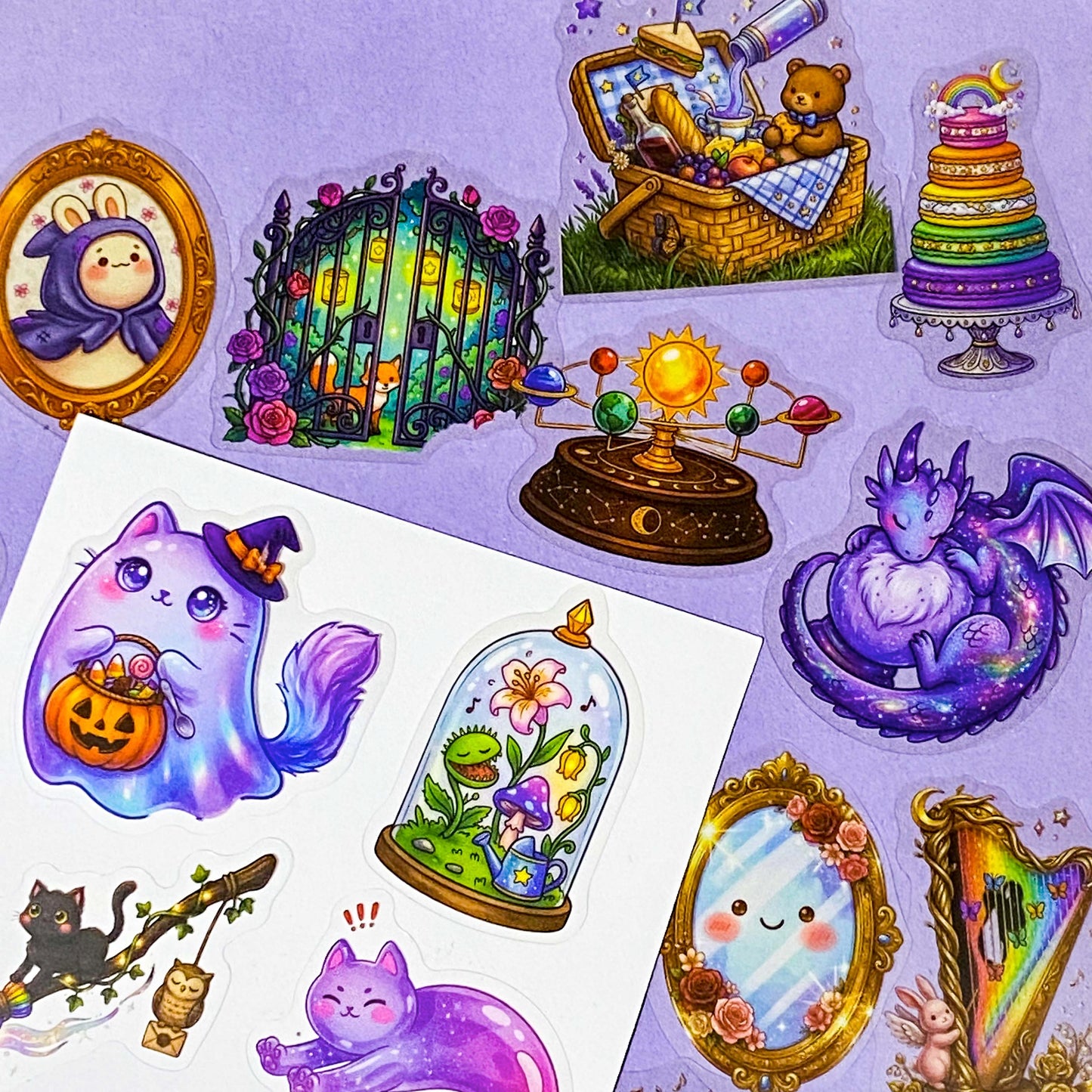 a pocketful of magic pet clear stickers, 50 different halloween and witchy designs including magical cats, potion books, celestial creatures, pumpkins, animals, owls, clocks and enchanted objects, uk cute and kawaii stationery shop.