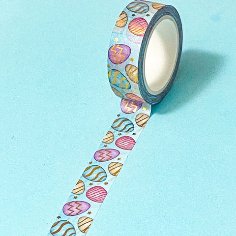 gold foil blue washi tape with an easter eggs pattern on a blue background