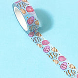 gold foil blue washi tape with an easter eggs pattern on a blue background