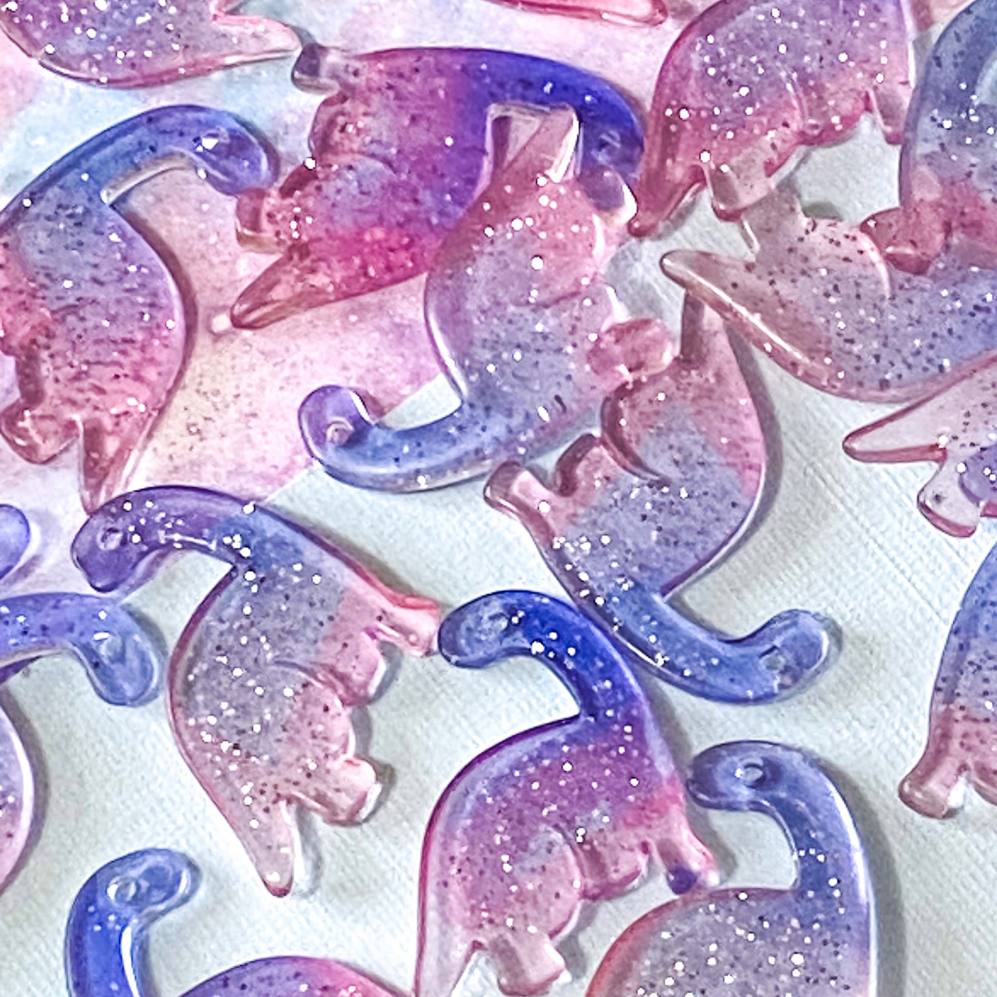 glittery glittery charm pendant charms pendants large big dino dinosaur dinosaurs pink lilac purple silver sparkly uk cute kawaii craft supplies shop store jewellery making flat transparent translucent clear ombre