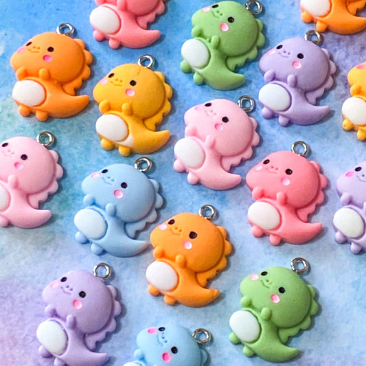 baby cute kawaii dino dinos dinosaur dinosaurs charm charms resin pendant uk craft supplies shop store pretty fun jewellery making lilac pink orange green yellow