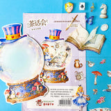 alice inspired mad hatter tea party snow globe PET sticker scene set with transparent stickers, card scene and teacups, books, mushrooms and cheshire cat illustrations