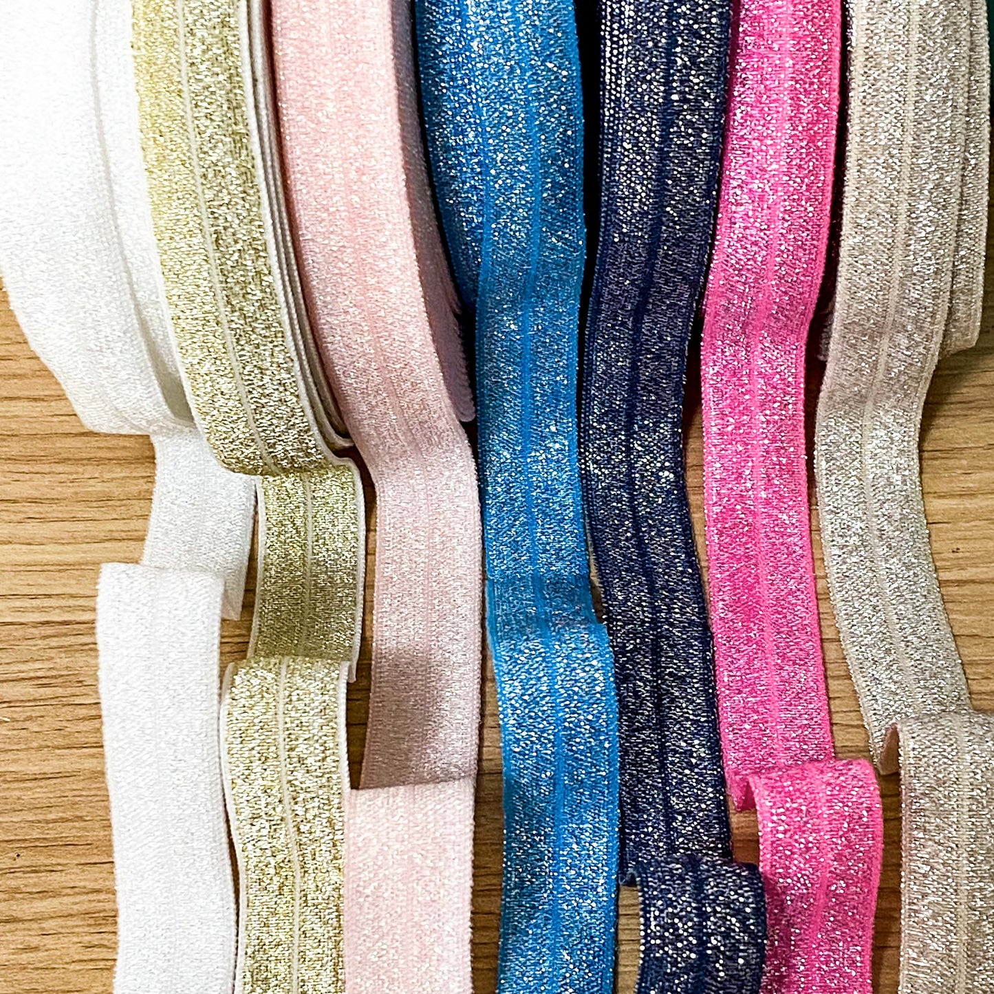 fold over elastic elastics ribbon ribbons glitter glittery foil foiled sparkly pretty craft supplies shop store crafts yard pink blue navy lilac gold silver white peach black pink  Edit alt text