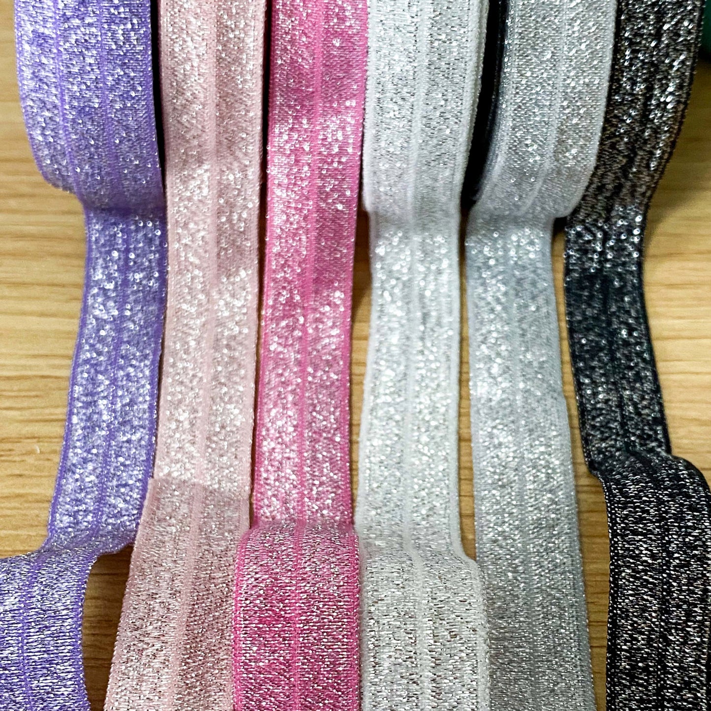 fold over elastic elastics ribbon ribbons glitter glittery foil foiled sparkly pretty craft supplies shop store crafts yard pink blue navy lilac gold silver white peach black pink  Edit alt text