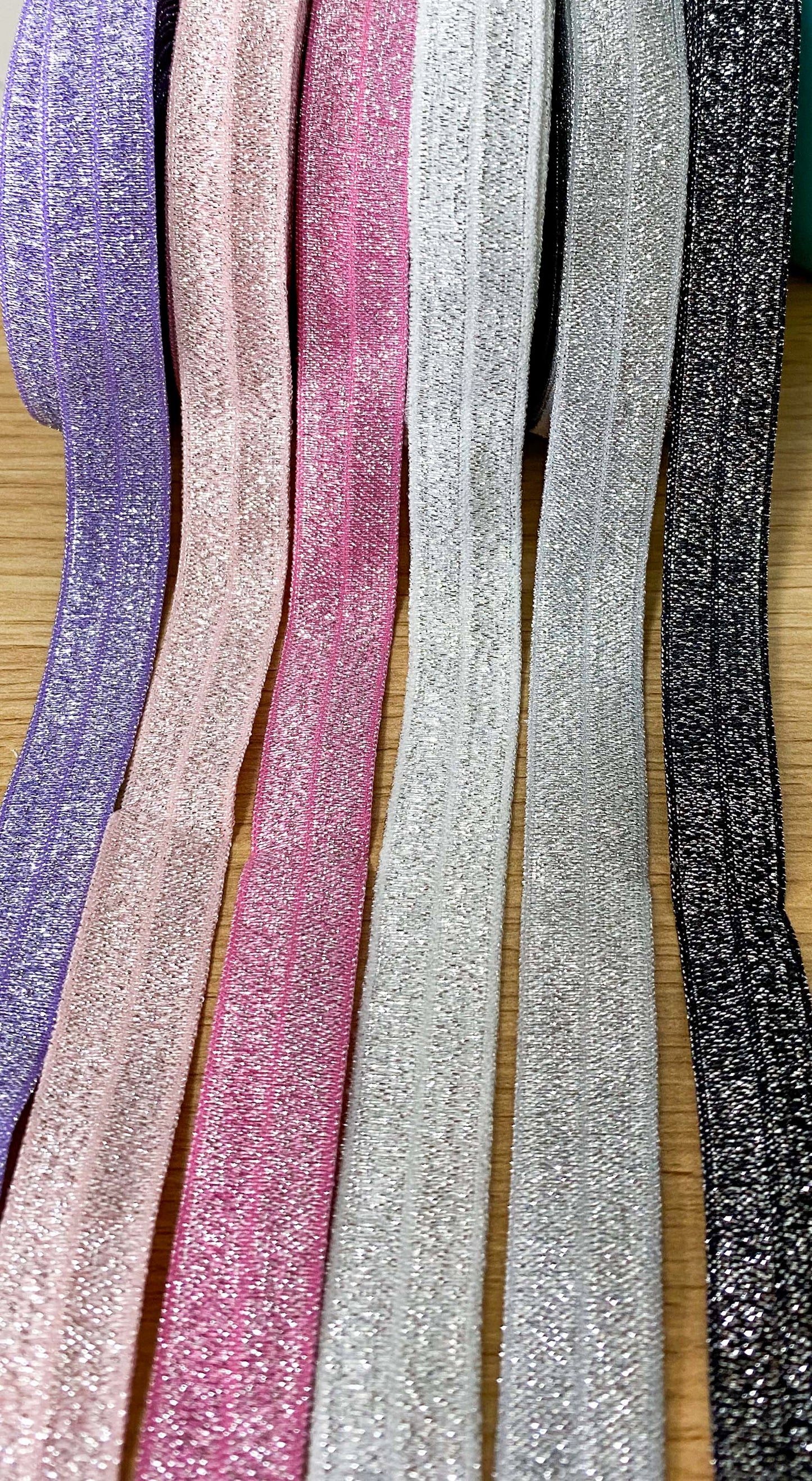 fold over elastic elastics ribbon ribbons glitter glittery foil foiled sparkly pretty craft supplies shop store crafts yard pink blue navy lilac gold silver white peach black pink  Edit alt text