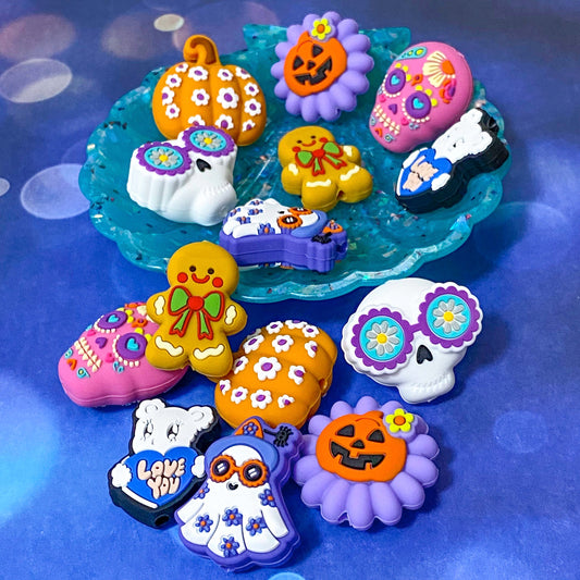 halloween spooky and festive christmas silicone bead beads jumbo very big large chunky make your own pen pens beaded uk craft supplies shop store pretty skull skulls gingerbread man men flower bear ghost ghosts pumpkin pumpkins pink purple orange blue