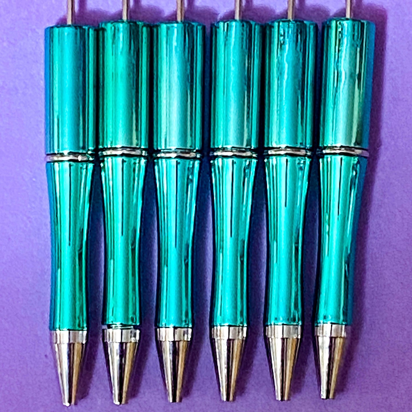 halloween pen base blank for making beaded pens in ombre glitter grey and black, glittery black, foil magenta purple and spooky foiled green turquoise. uk craft shop for autumn projects. black ink with refills.