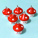 red and white mushroom mushrooms resin charm charms pendant pendants cute kawaii uk craft supplies shop store smiling happy face faces 20mm silver tone hook jewellery making woodland theme autumn spot spotted fungi toadstool toadstools