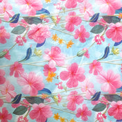 pink meadow flowers (cosmos) on a pale blue backgound tissue paper sheet