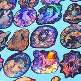 witch and woodland magical theme holo laptop stickers set of 50 on a blue background