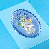 white bunny iron on fabric applique patch on a blue background