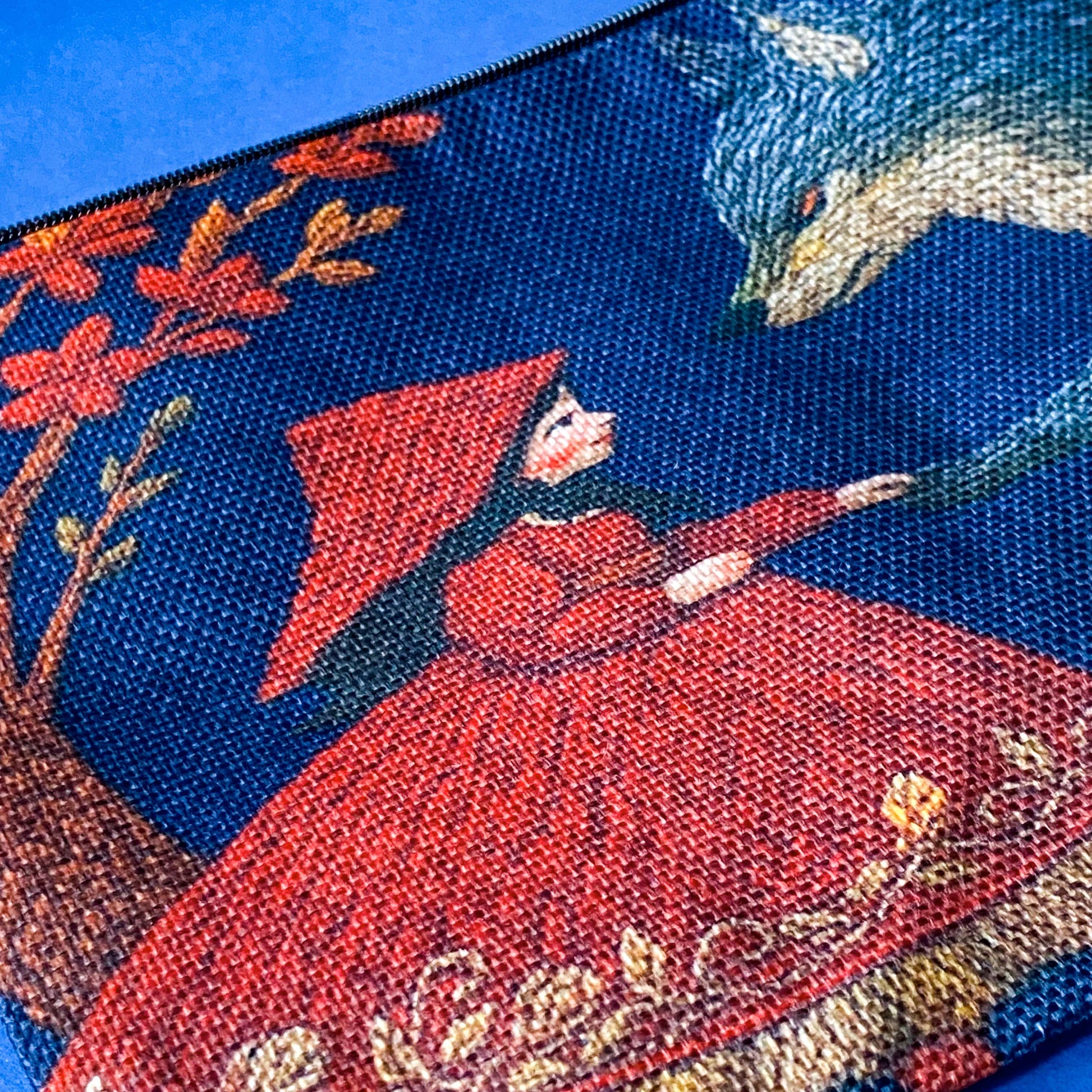 close up of canvas pouch make up bag or journalling pouch with little red riding hood and the wolf vintage design