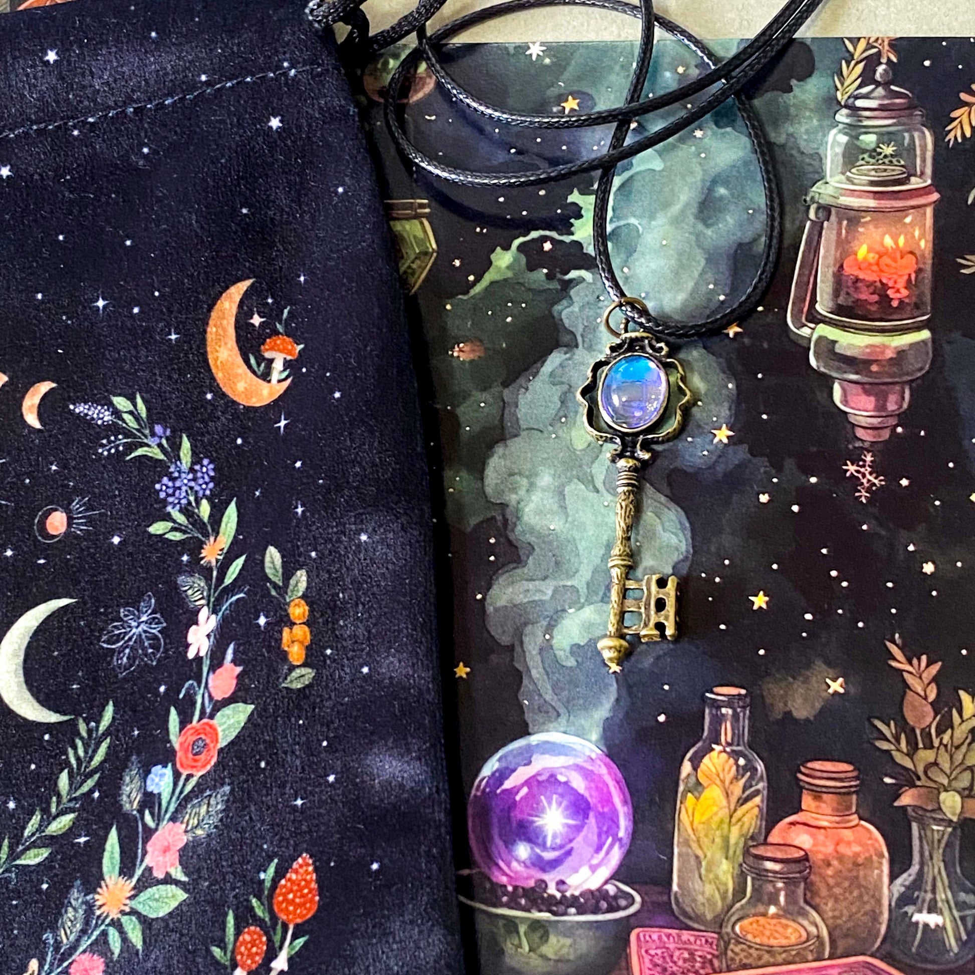 black velvet moon tarot pouch letterbox gift set with mystical postcards, acrylic moon tassel bookmark and antique key necklace with faux moonstone pendant
