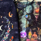 black velvet moon tarot pouch letterbox gift set with mystical postcards, acrylic moon tassel bookmark and antique key necklace with faux moonstone pendant