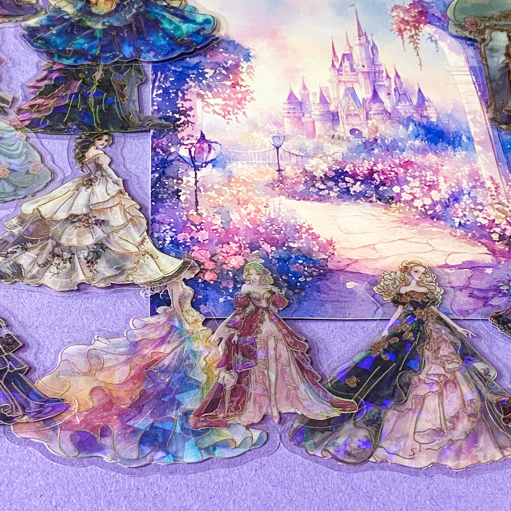 pack of 30 holographic princess stickers with gold foil outlines featuring elegant dancing princesses, castle scenes and fantasy ball gowns on transparent pet plastic clear material. uk cute stationery shop. storybook sticker set.