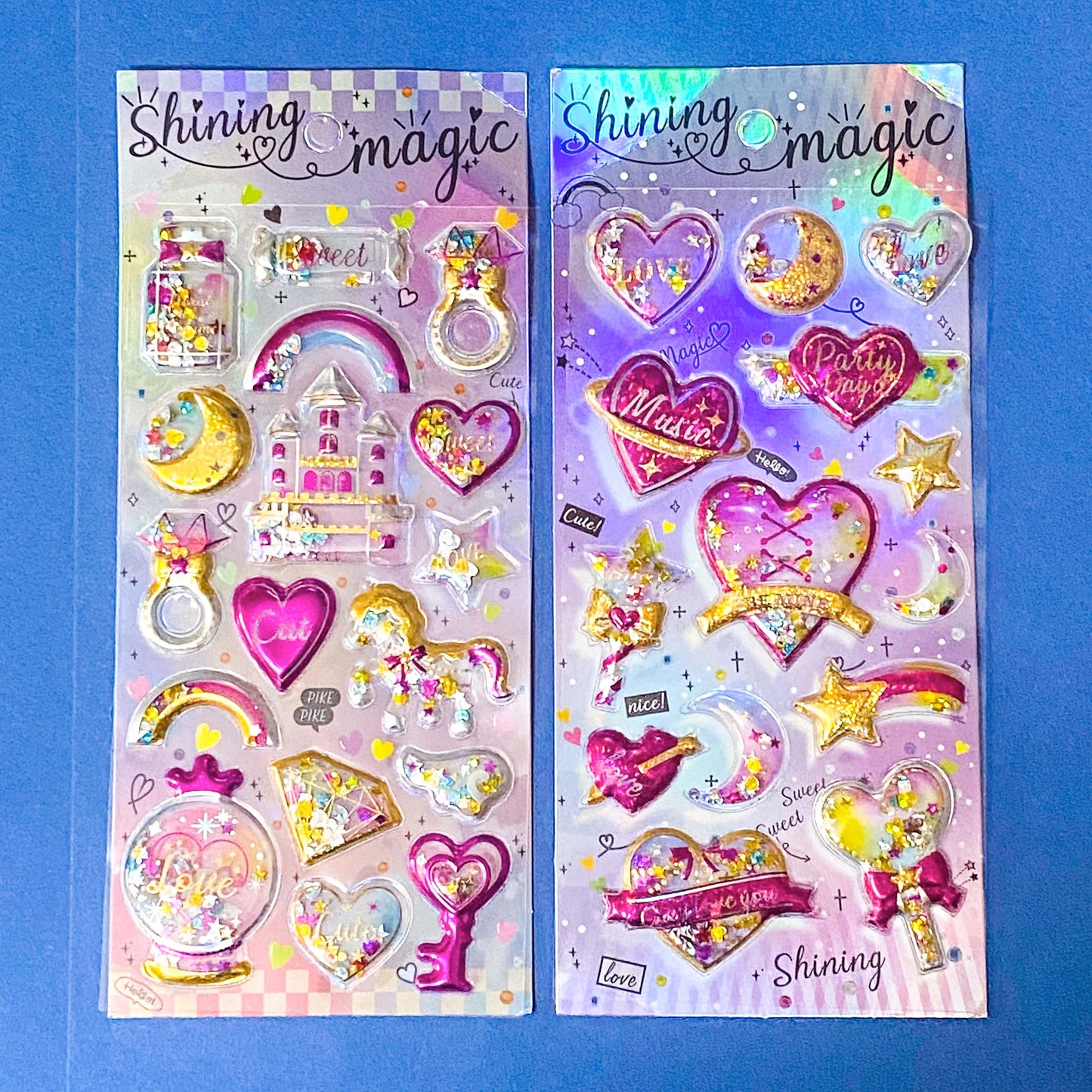 very large pack of 3d shaker puffy stickers with moving sequins and bright pink magical motifs