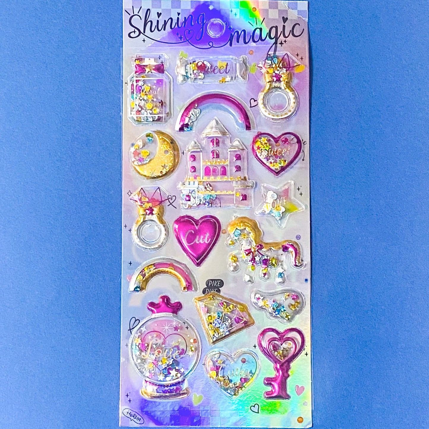 very large pack of 3d shaker puffy stickers with moving sequins and bright pink magical motifs