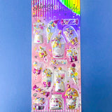 very large pack of 3d shaker puffy stickers with moving sequins and bright pink magical motifs