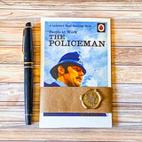 nostalgic ladybird book cover postcard set people at work with the policeman wrapped in a kraft belly band with a vintage wax seal sticker