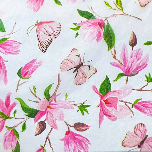 pink floral and butterflies on white tissue paper sheets