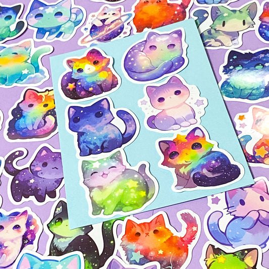 cat space themed laptop glossy sticker pack of 50 on a purple and blue background
