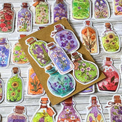 botanical potion bottle stickers with flowers in glass jars, floral vintage apothecary glossy laptop sticker set