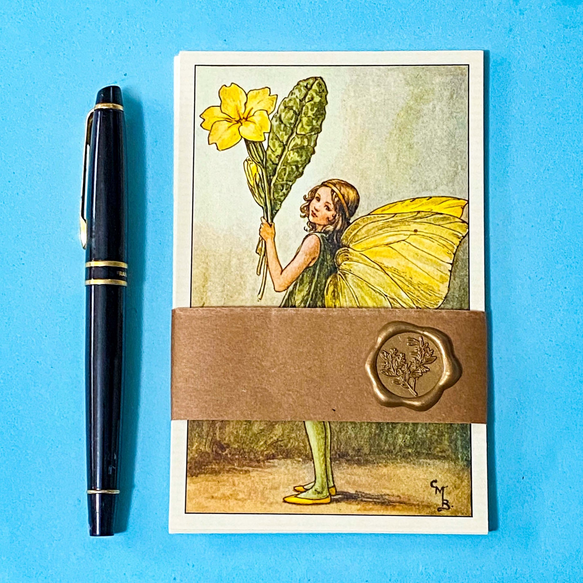 vintage flower fairy postcard set wrapped in kraft belly band and wax seal featuring primrose fairy
