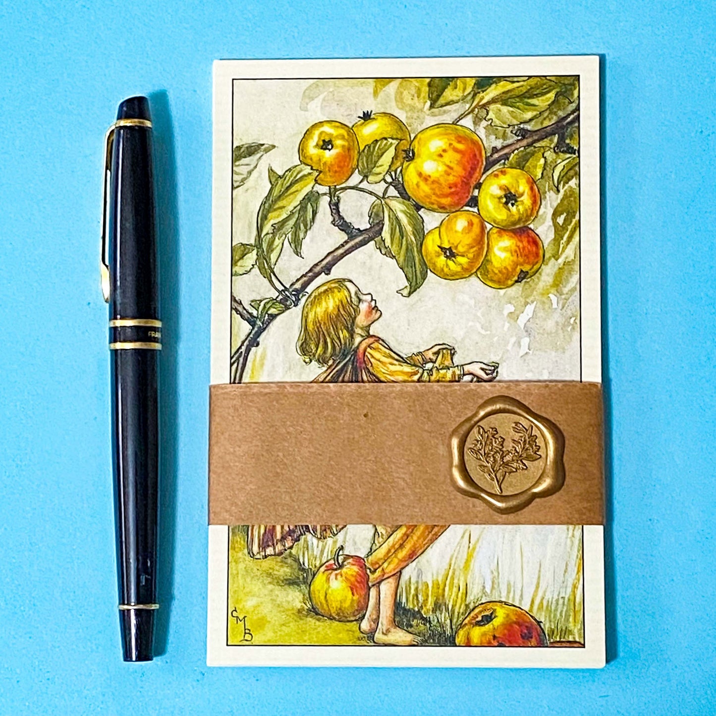 flower fairy postcard set wrapped with kraft band and wax seal sticker on a blue background