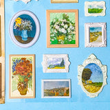 Collection of framed paintings stickers with 3d frames and artworks on a blue background