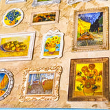 sticker pack of miniature Van Gogh paintings in various frames on a textured surface.