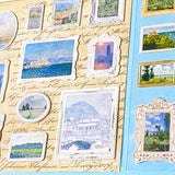 Collection of small framed artworks stickers on a textured surface with visible text