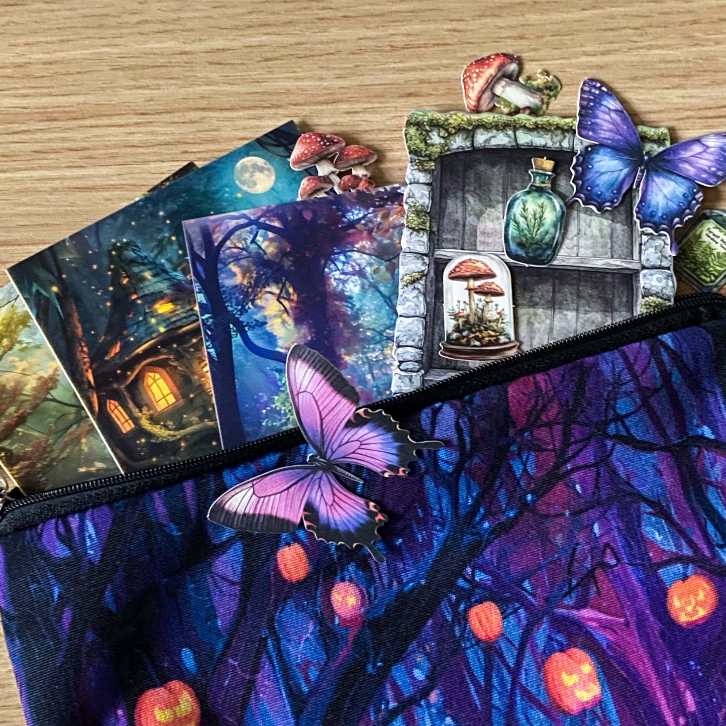 moonlit forest gift set with illustrated magical woodland pouch, butterfly stickers and cottage postcards in deep blue and purple tones