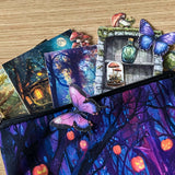 moonlit forest gift set with illustrated magical woodland pouch, butterfly stickers and cottage postcards in deep blue and purple tones