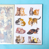 cat elf sticker book of 20 clear sheets of vintage cats and flowers pet stickers on a blue background