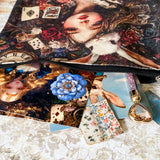 letterbox gift set with alice in wonderland vintage pouch, postcards, stickers and crystal ballpoint heart pen
