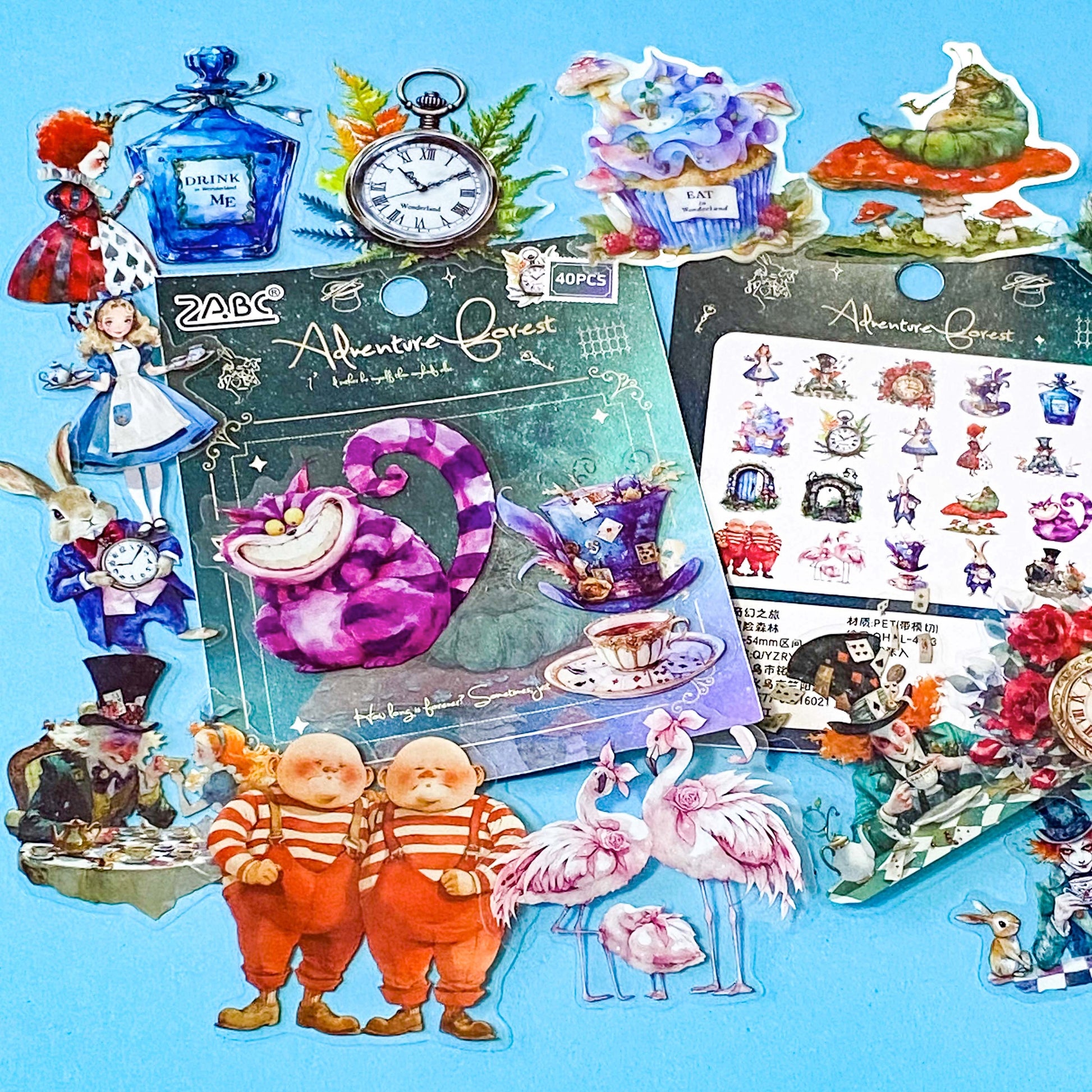 vibrant clear plastic PET stickers with an Alice in wonderland theme including illustrations of flamingo eat me cake, drink me potion, white rabbit, caterpillar on mushroom and pocket watch