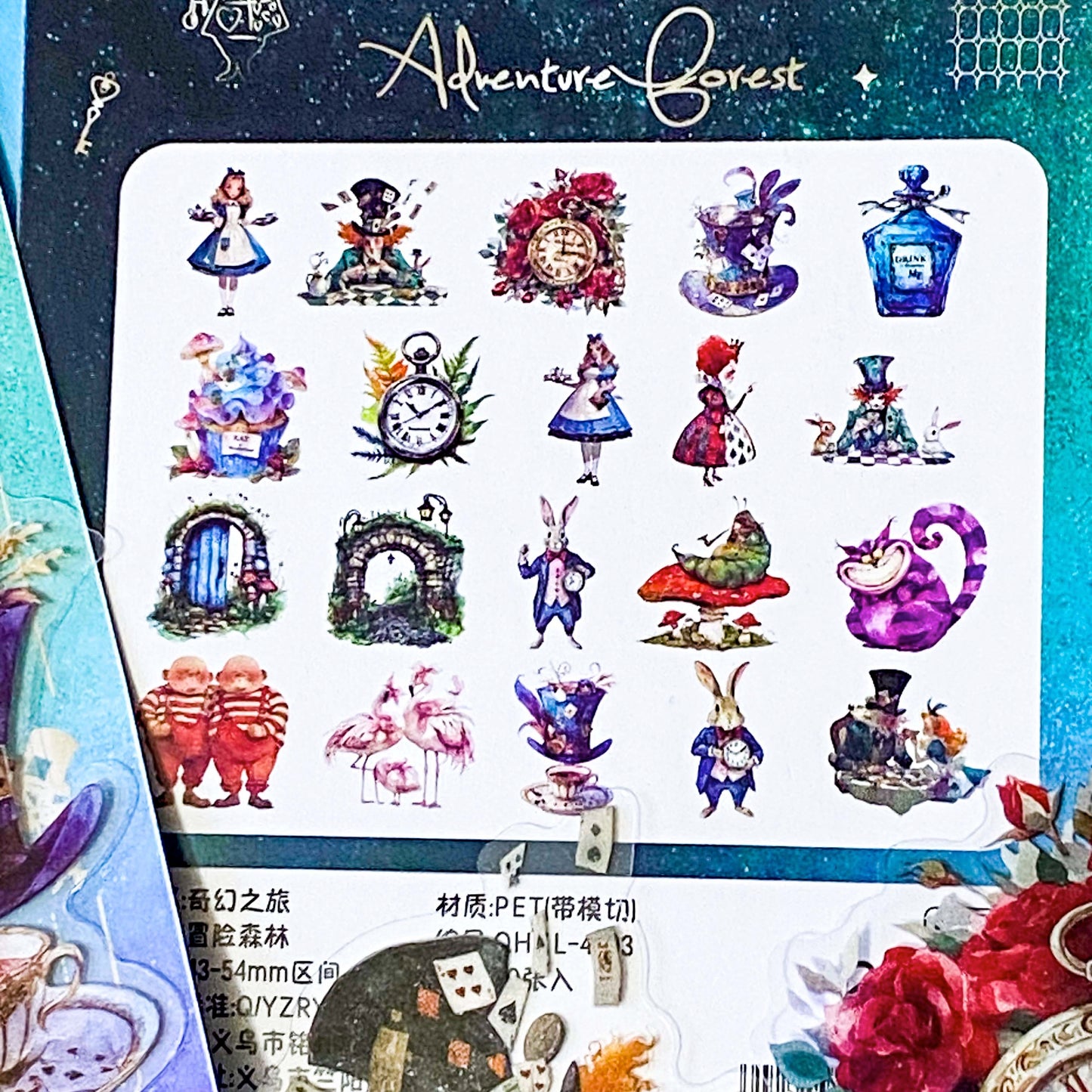vibrant clear plastic PET stickers with an Alice in wonderland theme including illustrations of flamingo eat me cake, drink me potion, white rabbit, caterpillar on mushroom and pocket watch