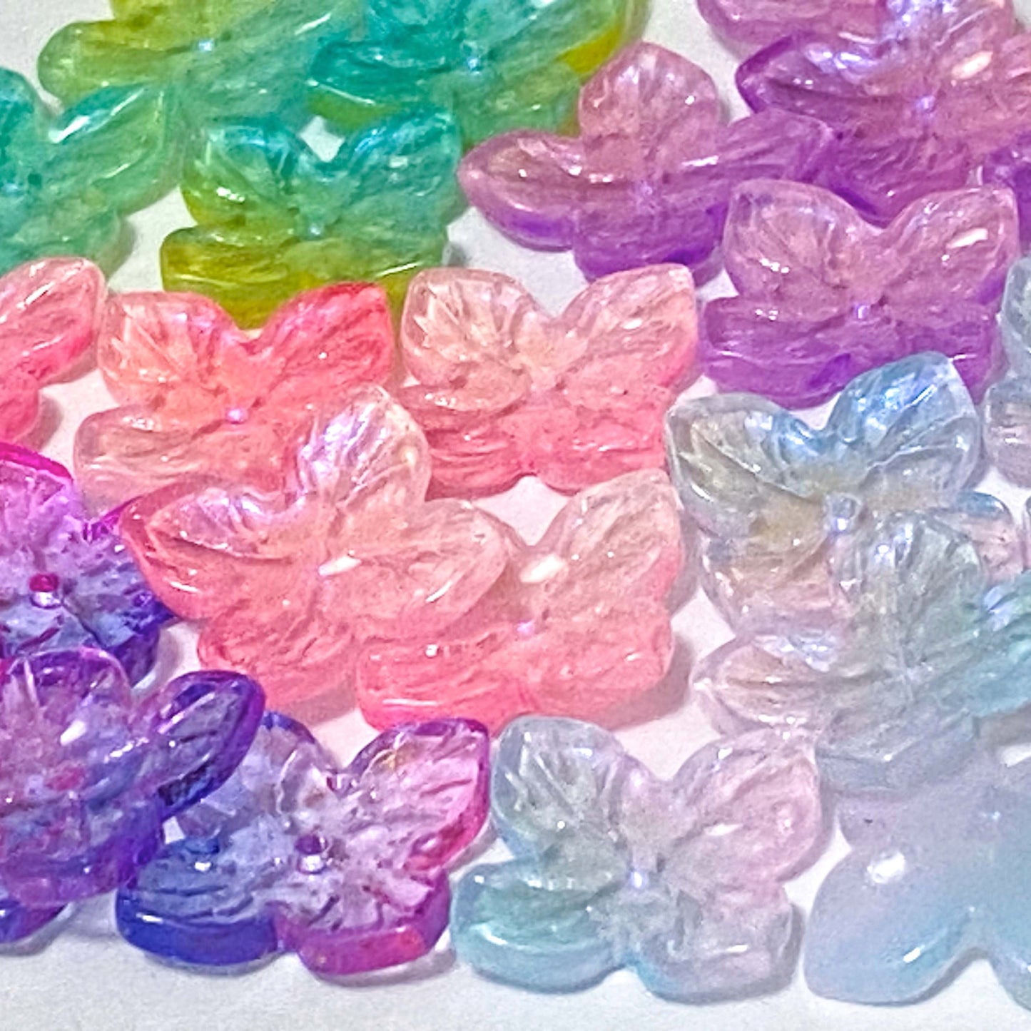 iridescent ab coated glass 4 petal petalled flower flowers bead beads uk cute kawaii colourful craft supples shop store pink lilac purple turquoise green blue shimmer 18mm jewellery making 