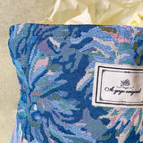 blue, pale pink and turquoise chrysanthemum tapestry pouch with woven floral fabric, cream lining, concealed zip closure and gusseted base. Botanical make up cosmetic pouch, large pencil case or journaling bag. Uk gifts shop. Gifts for flower lovers.