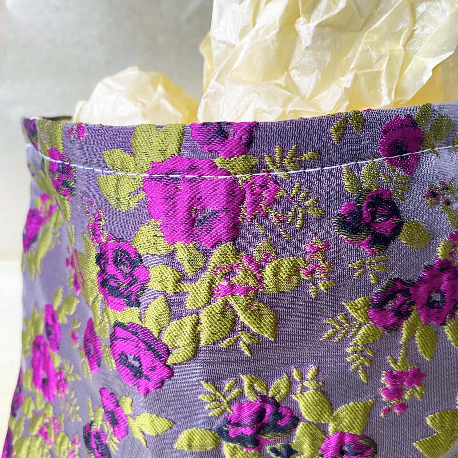 purple and green tapestry cometic pouch with woven satin-finish fabric with roses design, concealed zip, cream lining and gusseted base. Victorian inspired floral gift ideas from uk shop. museum quality cosmetic bag.