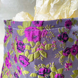 purple and green tapestry cometic pouch with woven satin-finish fabric with roses design, concealed zip, cream lining and gusseted base. Victorian inspired floral gift ideas from uk shop. museum quality cosmetic bag.