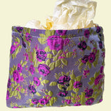 purple and green tapestry cometic pouch with woven satin-finish fabric with roses design, concealed zip, cream lining and gusseted base. Victorian inspired floral gift ideas from uk shop. museum quality cosmetic bag.