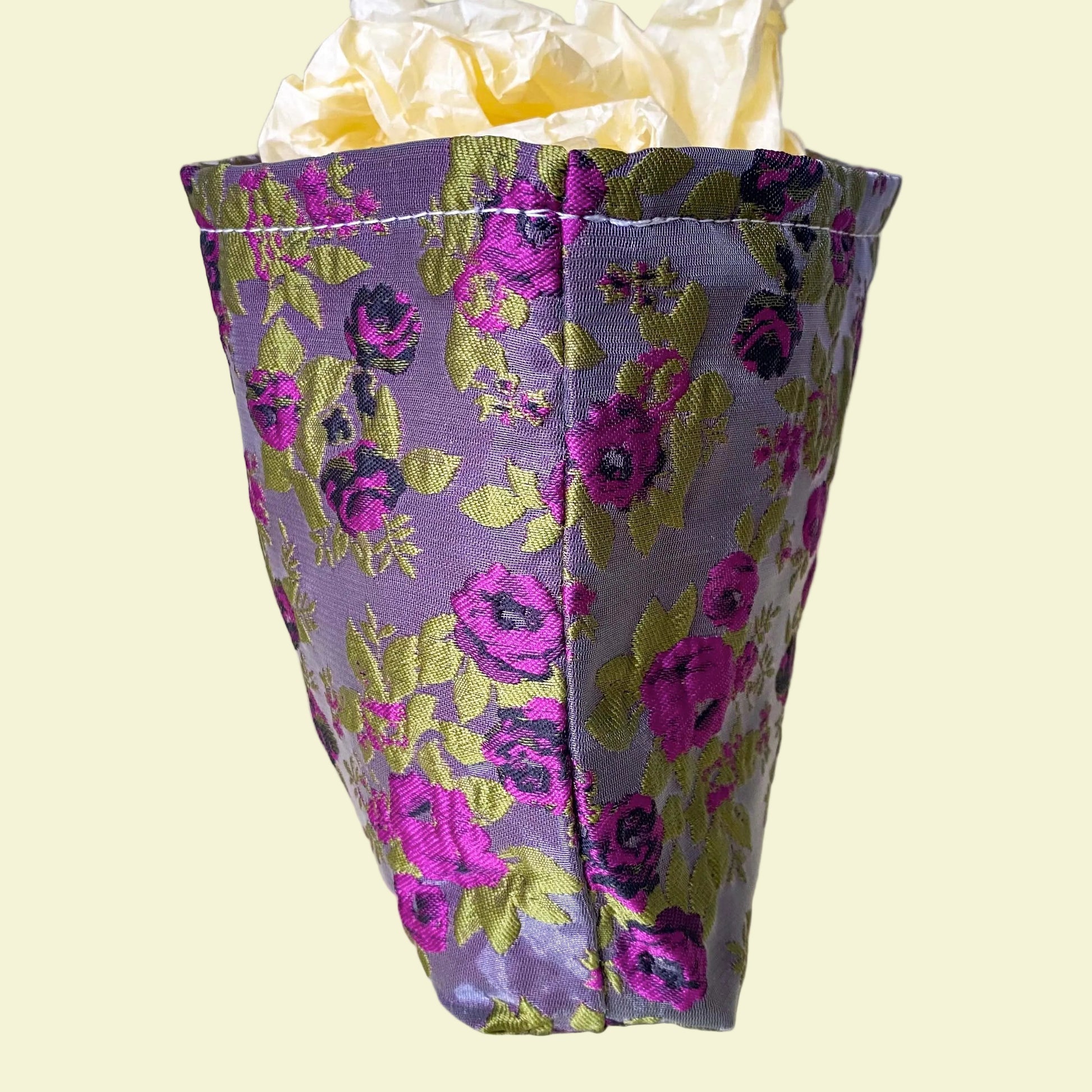 purple and green tapestry cometic pouch with woven satin-finish fabric with roses design, concealed zip, cream lining and gusseted base. Victorian inspired floral gift ideas from uk shop. museum quality cosmetic bag.