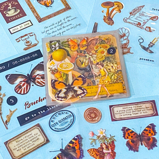 pack of vintage style clear sticker sheets featuring butterflies, flowers, labels and botanical illustrations on transparent background