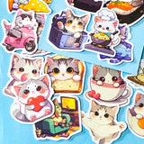 kawaii cat adventure laptop stickers pack with 50 colourful cute cartoon cat stickers on a blue background