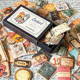 Collection of 100 matte paper vintage-style labels with a prominent 'Label' box on a textured surface.