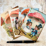fanned vintage postcards set showing toadstool and cottage garden victorian style artwork