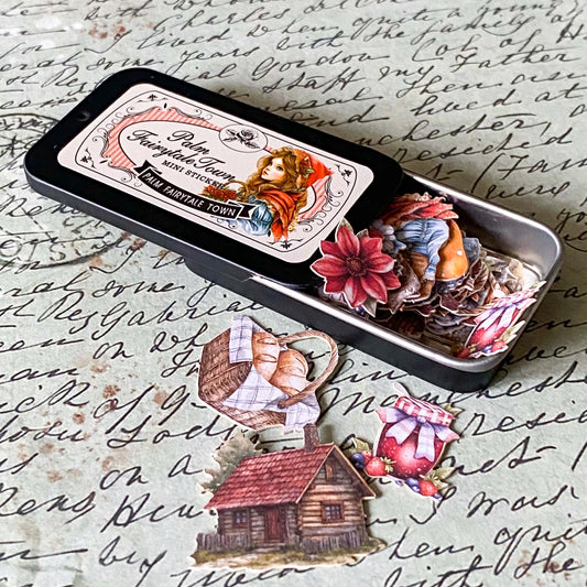 little red riding hood themed mini tin of stickers with vintage woodland theme including cottage, animals and red cloak girl