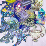 magic magical spooky sticker stickers flake flakes pack of 30 very large big holo holographic foil clear plastic pet black cat cats gems crystal crystals moon candle book potion bottle hat witch witches witchcraft uk cute kawaii stationery shop store purple lilac blue yellow vibrant sparkly glitter